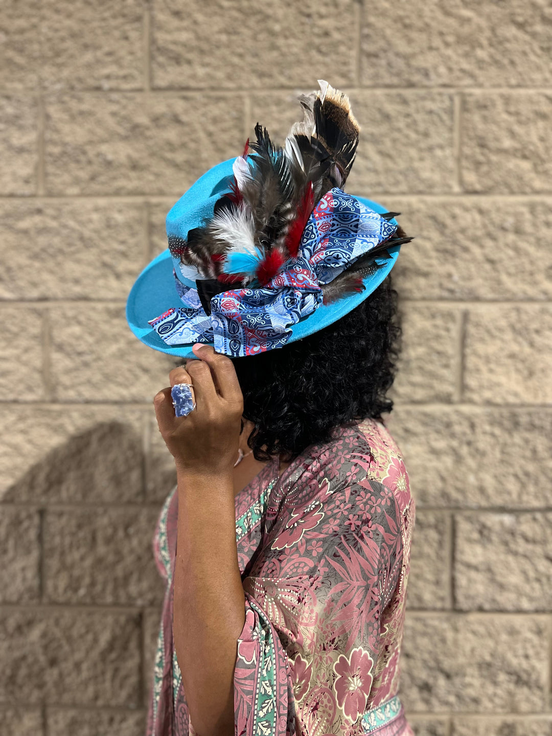 The Turquoise Feathered Hat